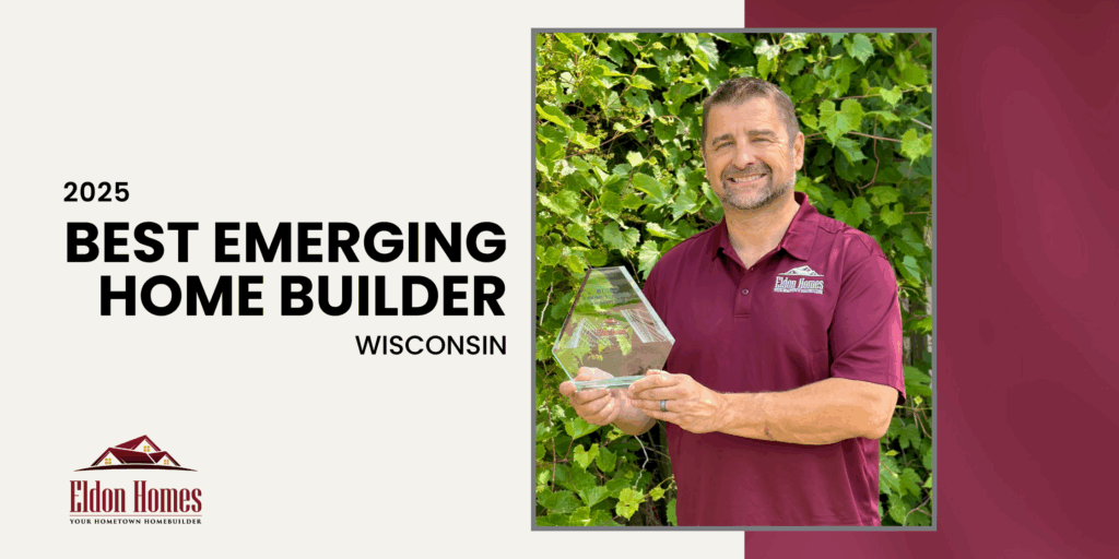 Rob Hostrawser holding the 2025 Best Emerging Builder - Wisconsin Award